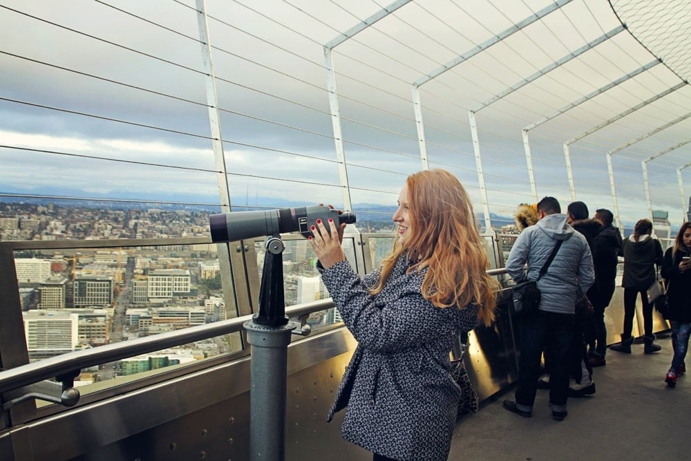 Top of Space Needle in Seattle. Our travel guide has all the inside tips you need to know before visiting the Space Needle - like the best time to visit, how to buy tickets for the Space Needle and more!