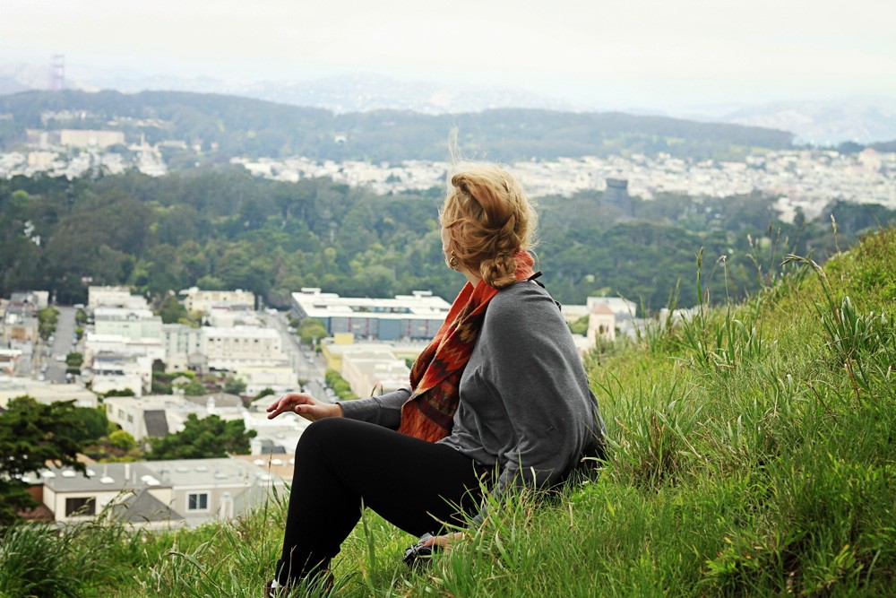 Le Chateau grey sweater and an orange scarf