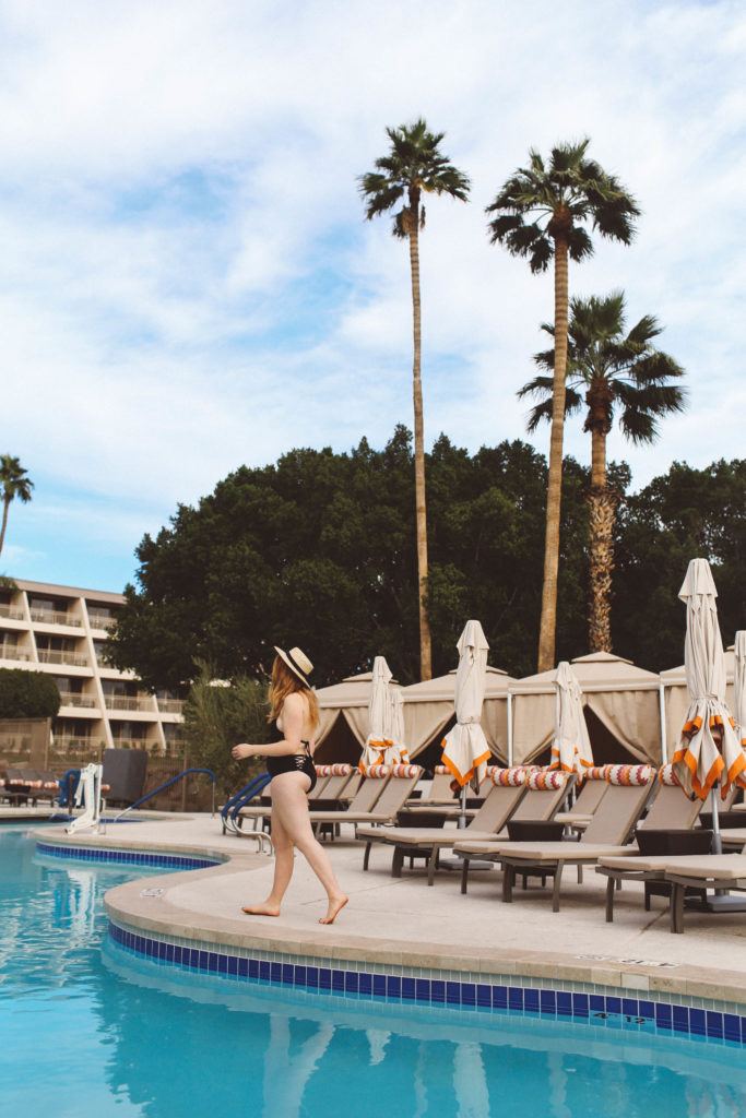 black swimsuit curvy woman