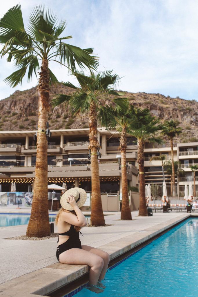 black swimsuit curvy woman