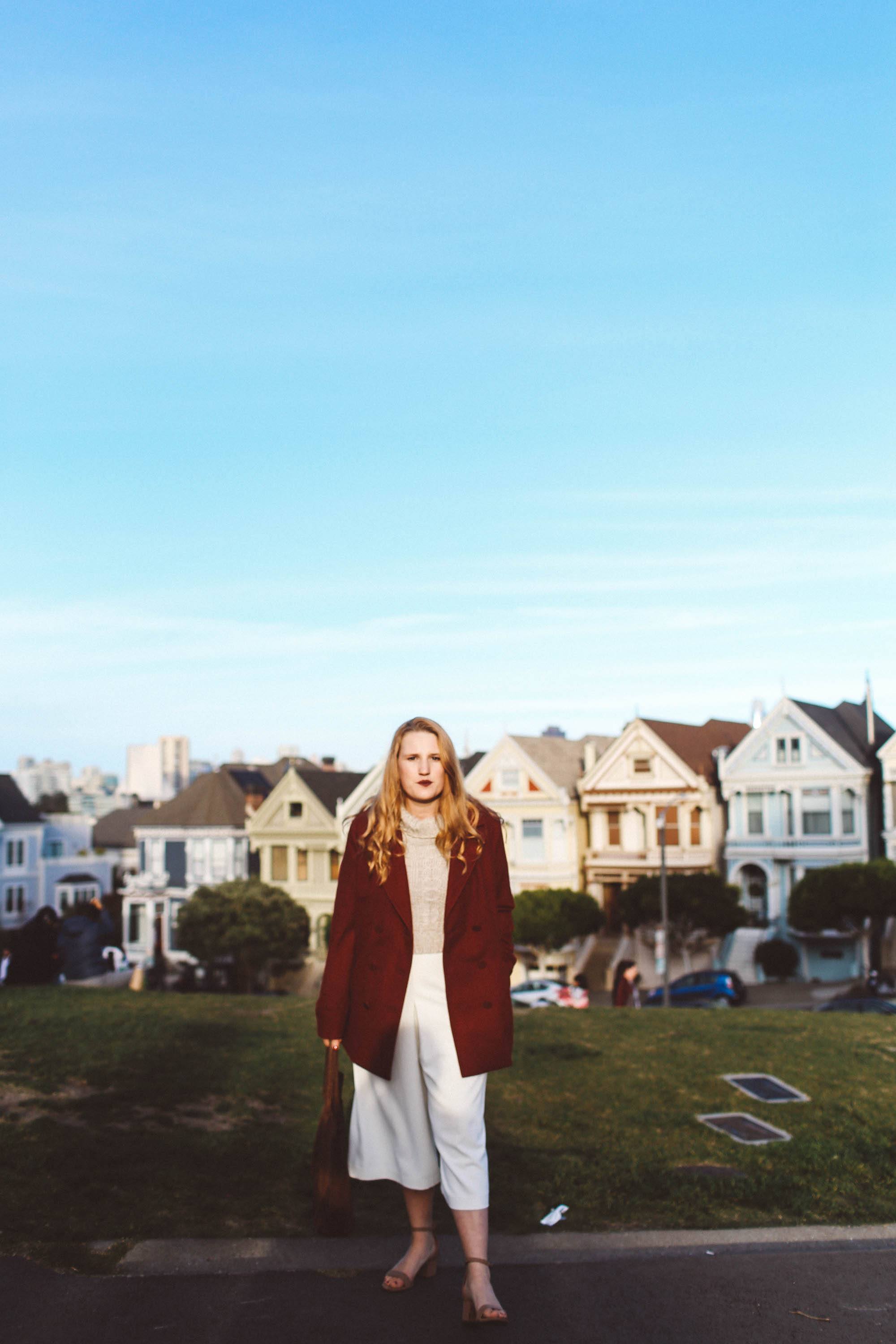red coat white pants painted ladies