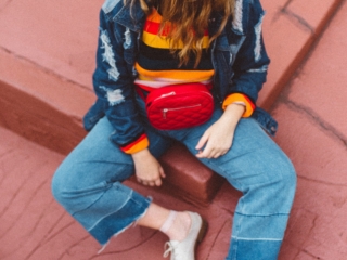 Woman wearing red fanny pack