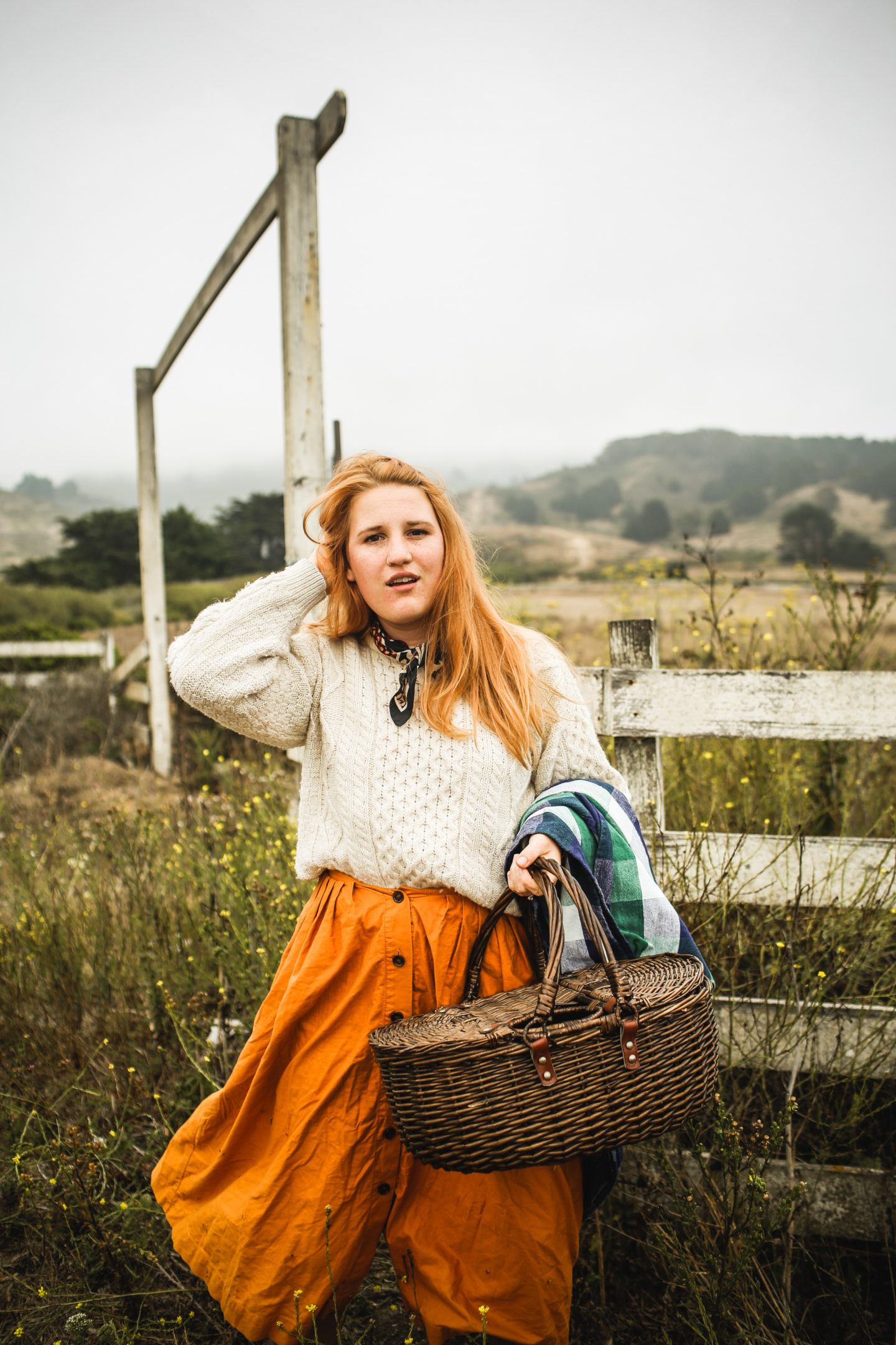 Woman holding a picnic basket