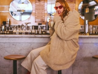 woman drinking milkshake