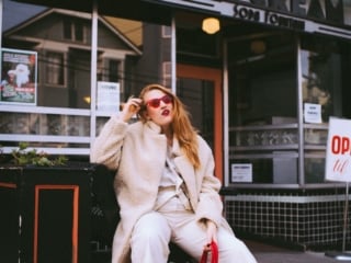 women in red ankle boots