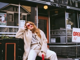women in red ankle boots