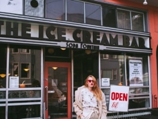 women in red ankle boots