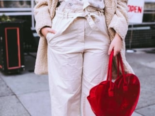 women in red ankle boots