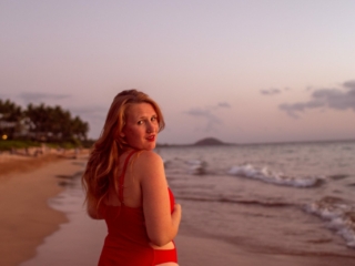 wearing my red swimsuit on Kiwakapu beach in maui
