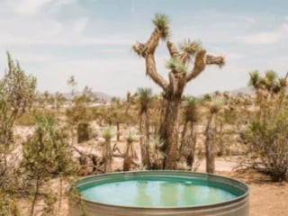 Chic desert hot tub at this Joshua Tree Airbnb
